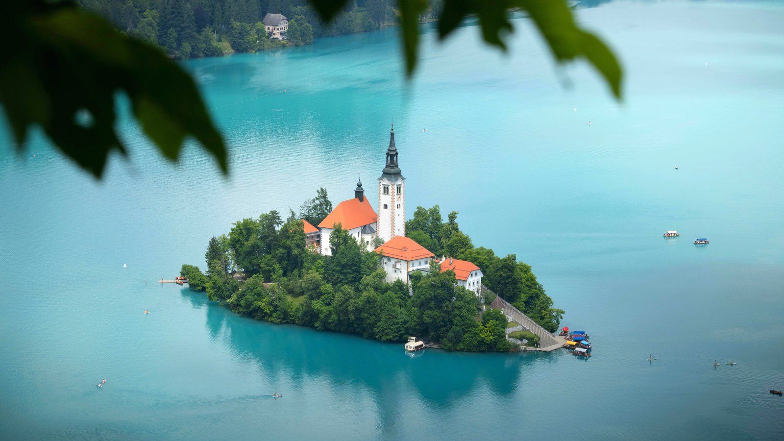 12 Most Romantic Destinations in Europe Lake Bled island with church and turquoise water in Slovenia