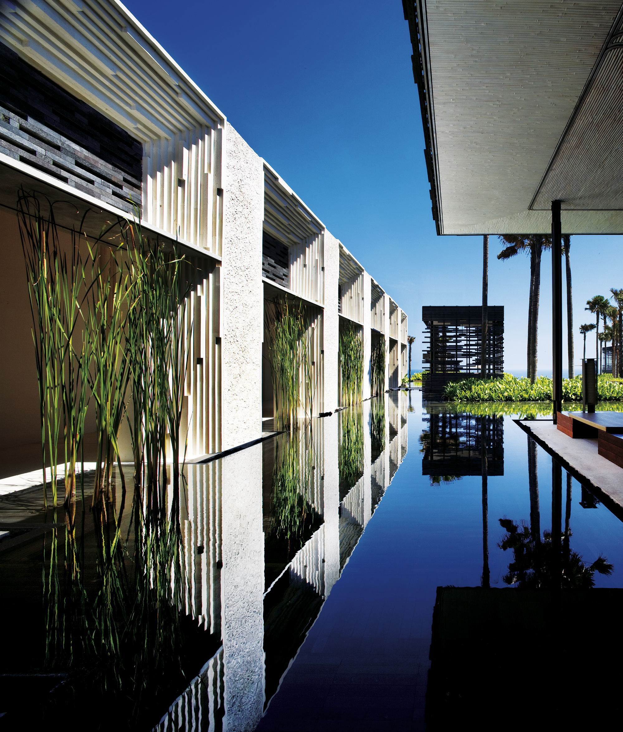 Contemporary pavilion and reflecting water at Alila Villas Uluwatu Bali