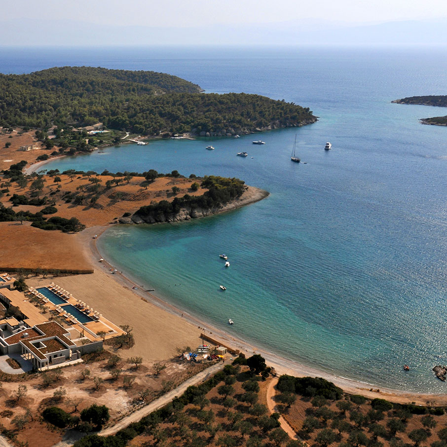 Aerial view of the private beach cove and Amanzoe Beach Club at Porto Heli, Greece
