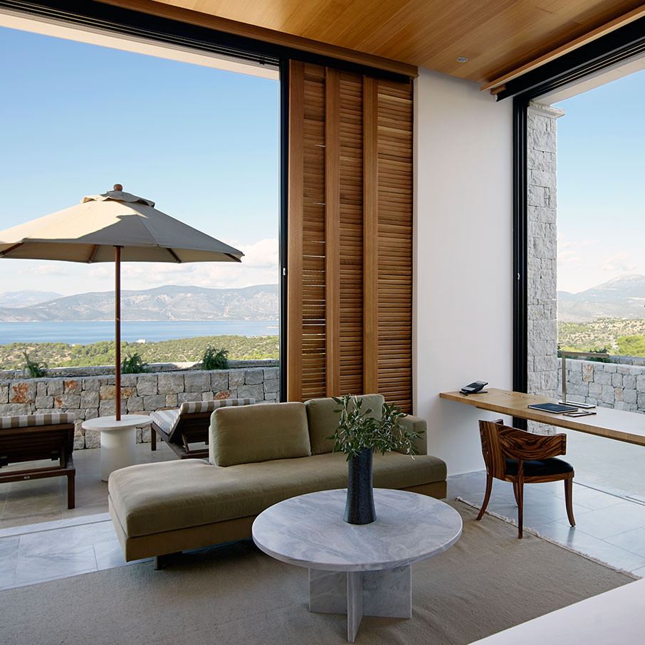 Interior of an Amanzoe villa showing its living space and furnishing