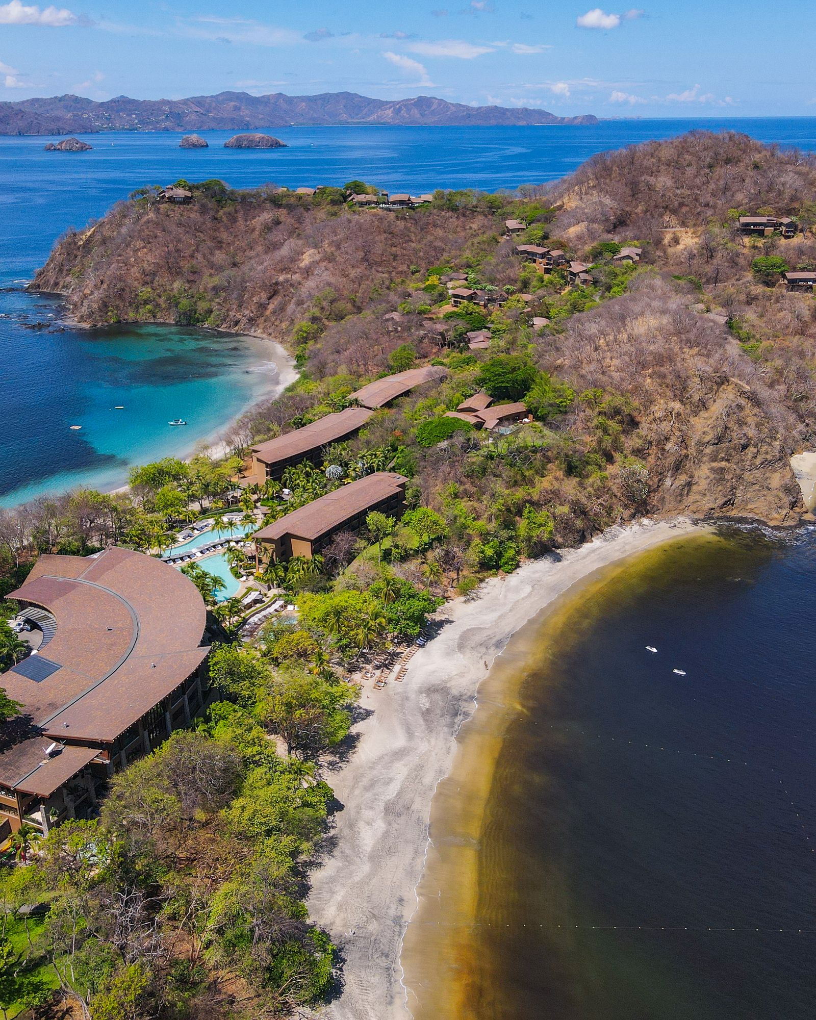 Aerial view of Four Seasons Resort Peninsula Papagayo with Costa Rica's forest and beaches