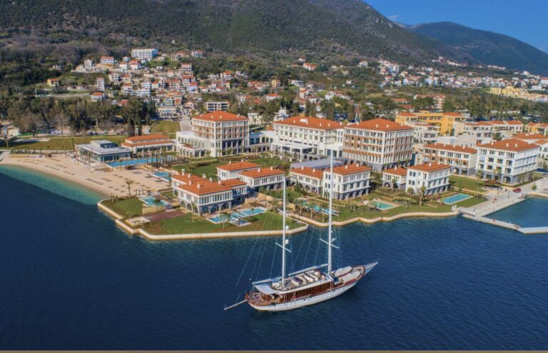 Aerial view of One&Only Portonovi with a yacht on Boka Bay