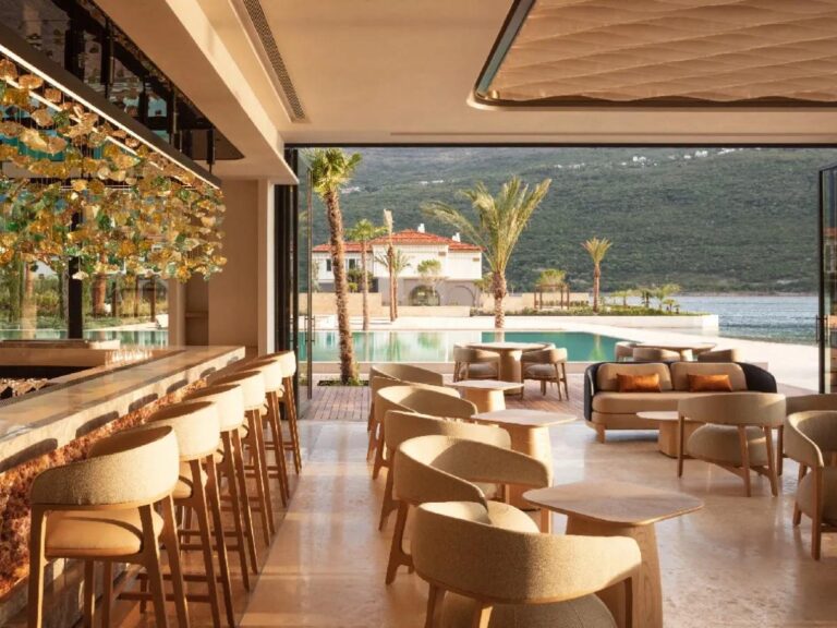 Sabia dining area beside the pool and bay at One&Only Portonovi